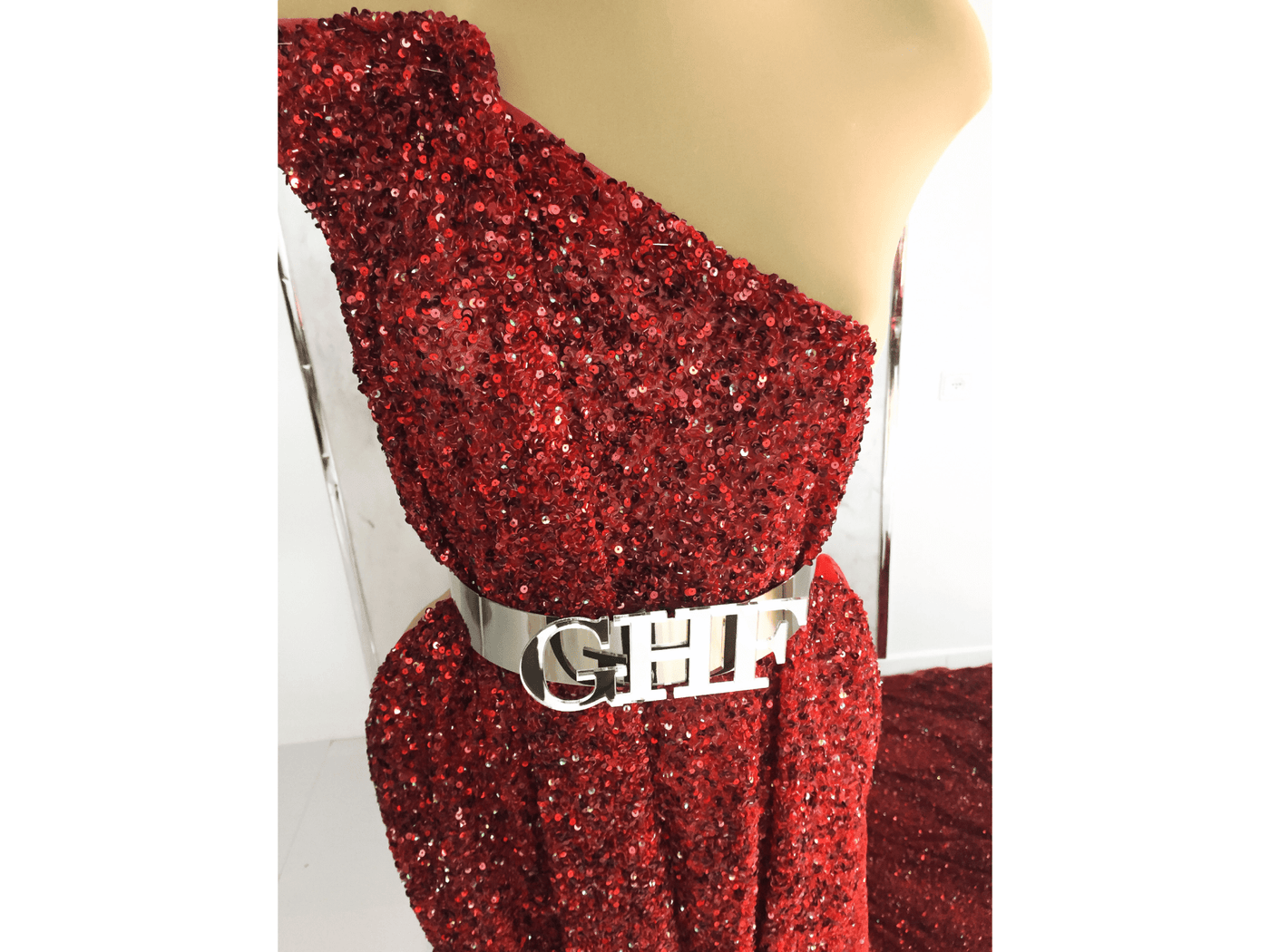 Red gown made with handmade sequins lace | Glam House Fabrics